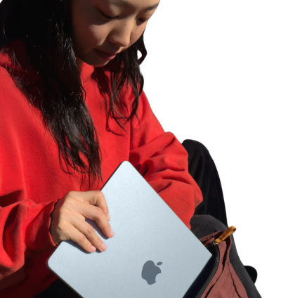 Girl keeping MacBook